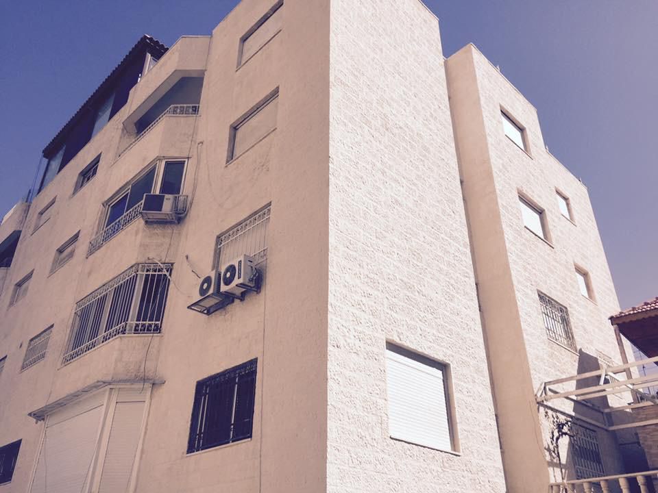 مباني تنظيف واجهات حجر بعد